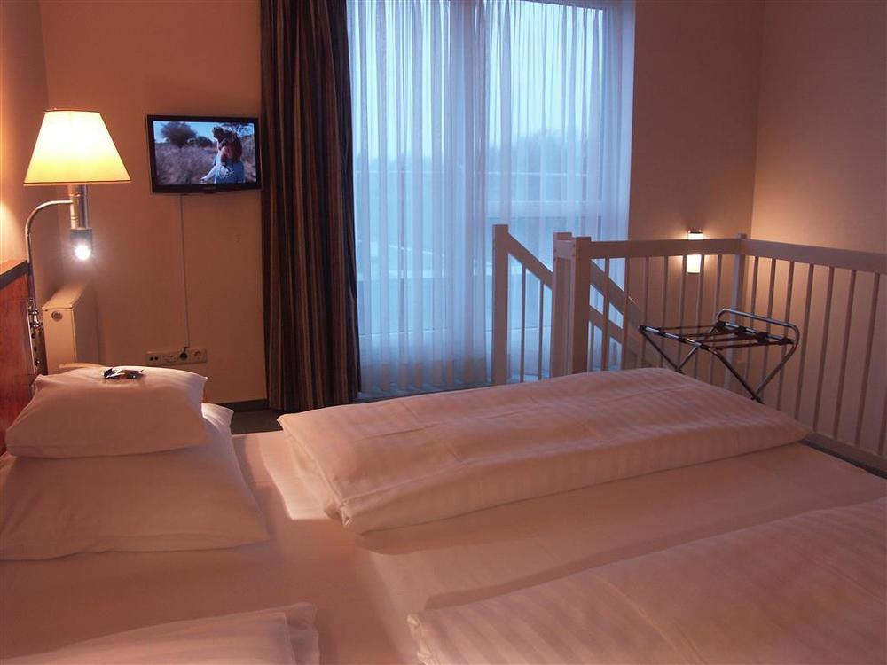 Hotel Arkadia Friedrichsdorf Szoba fotó